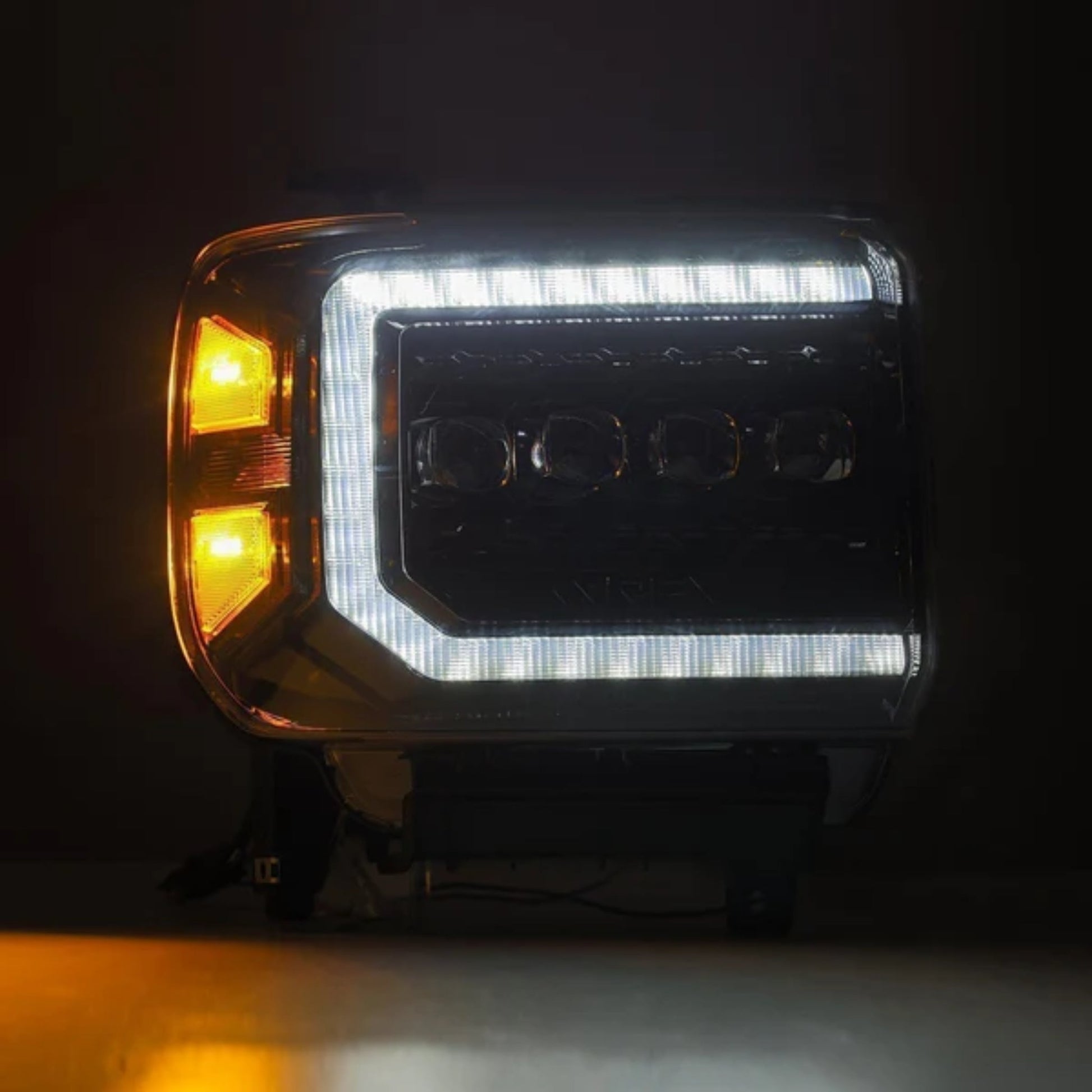 GMC Sierra: Multicolor Flow Series Alphablack Headlights (2014-2018) - image 2