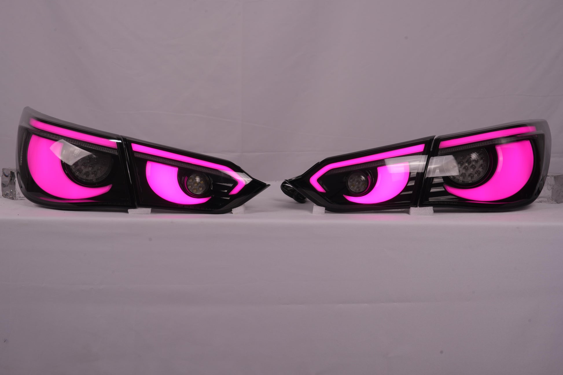 Infiniti Q50 Hawkeye style RGB tail lights pink lighting